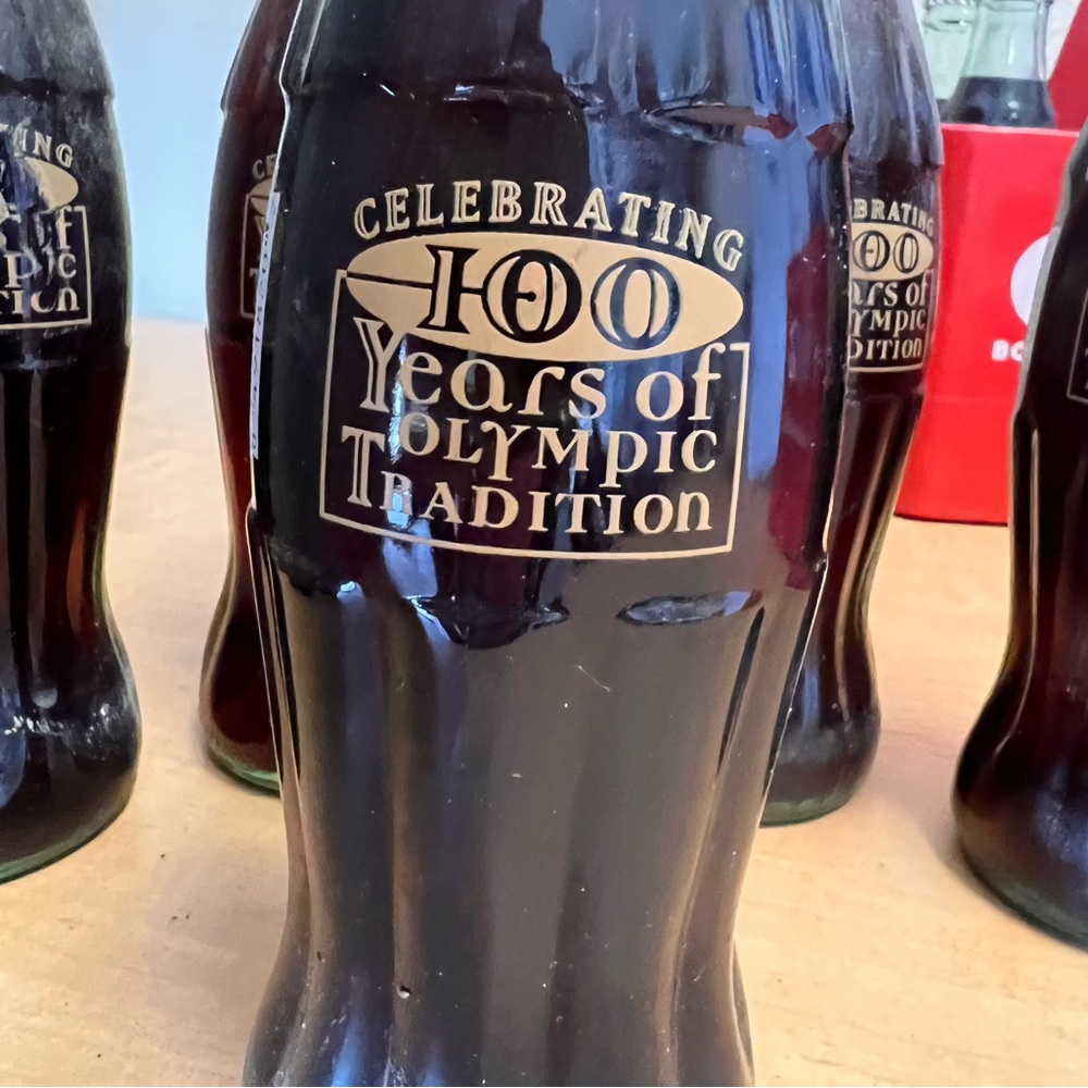 Coca Cola bottles. 100 years Olympic tradition.